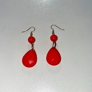 Red dangling earrings